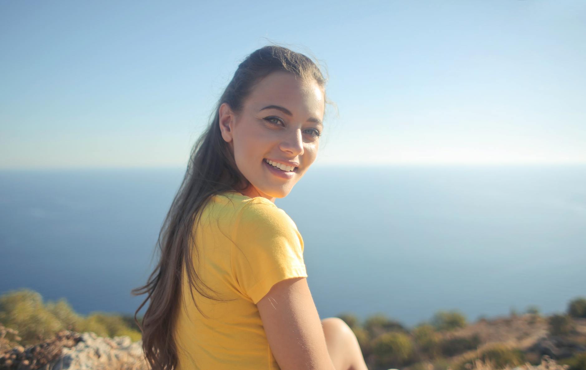 woman wearing yellow shirt