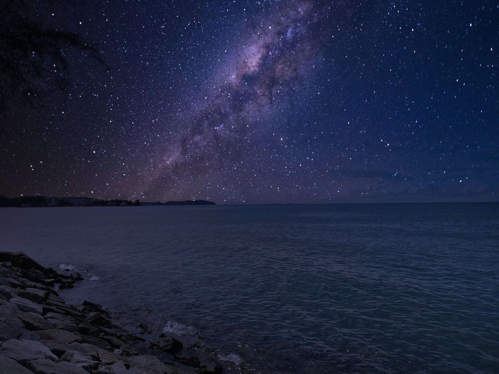 amazing starry sky with milky way galaxy over sea at night