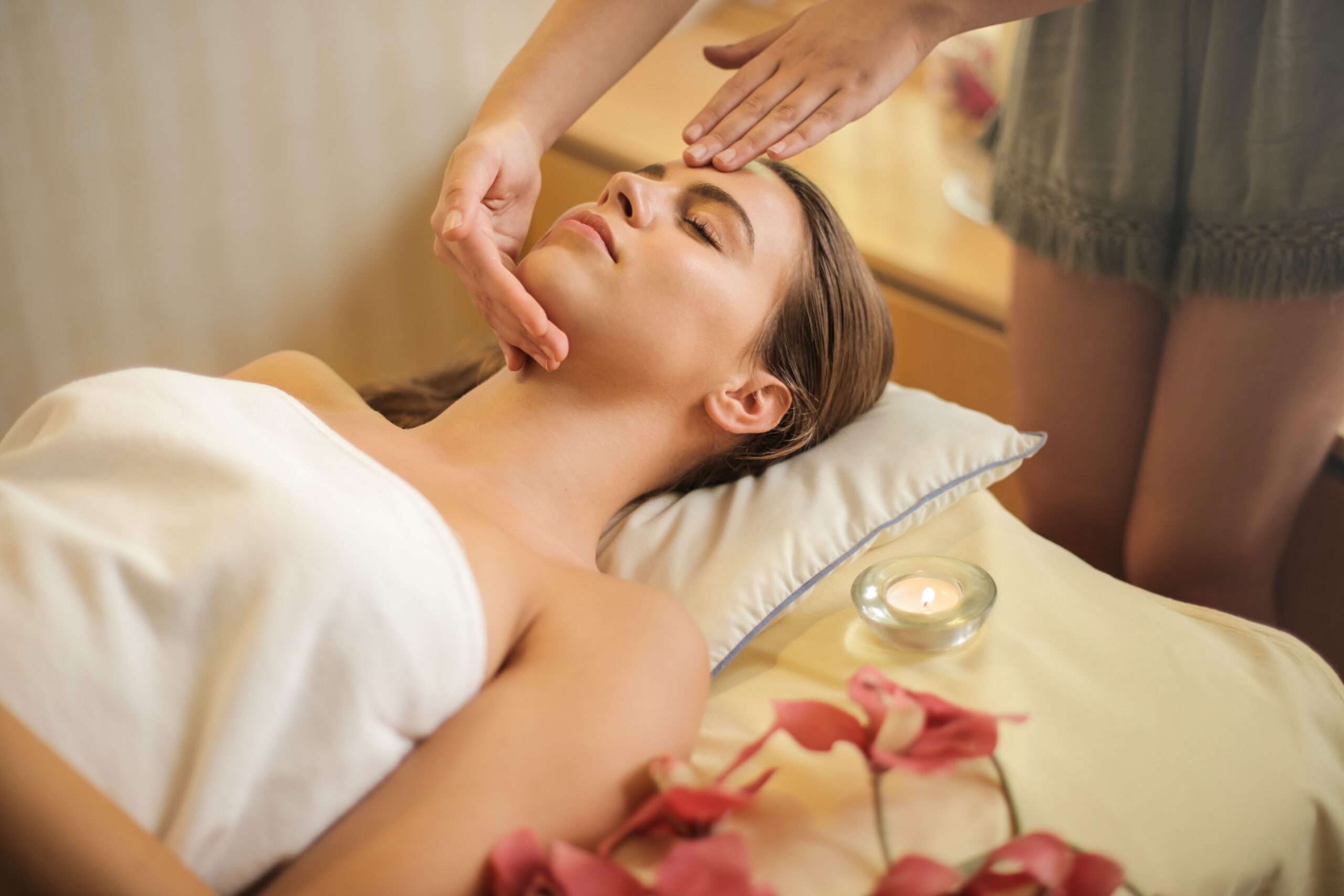 Guilty Pleasures - photo of woman receiving a facial massage