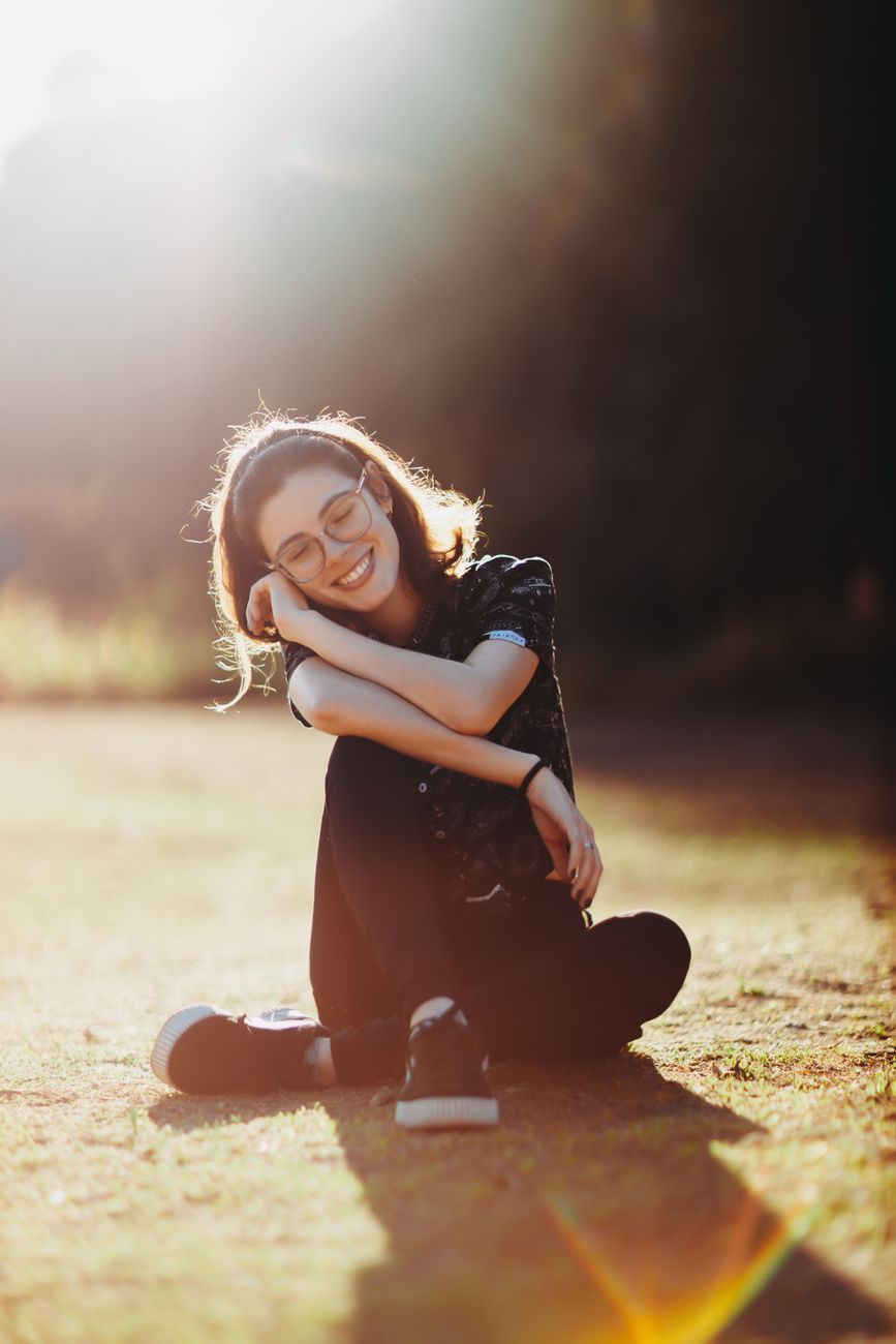 portrait of a happy young woman with eyeglasses