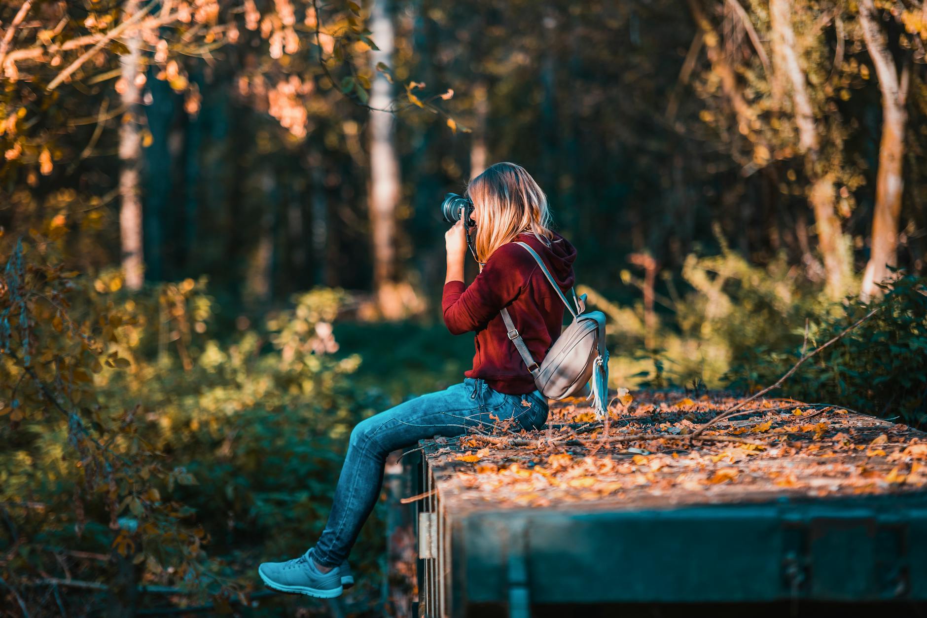 woman taking picture using camera