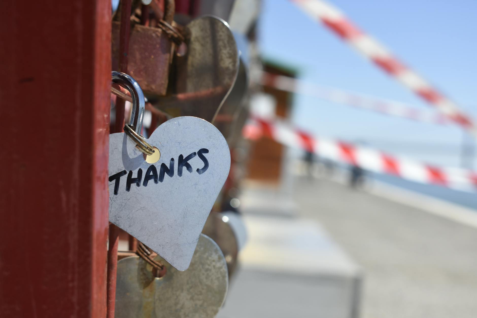 silver colored heart lock bridge