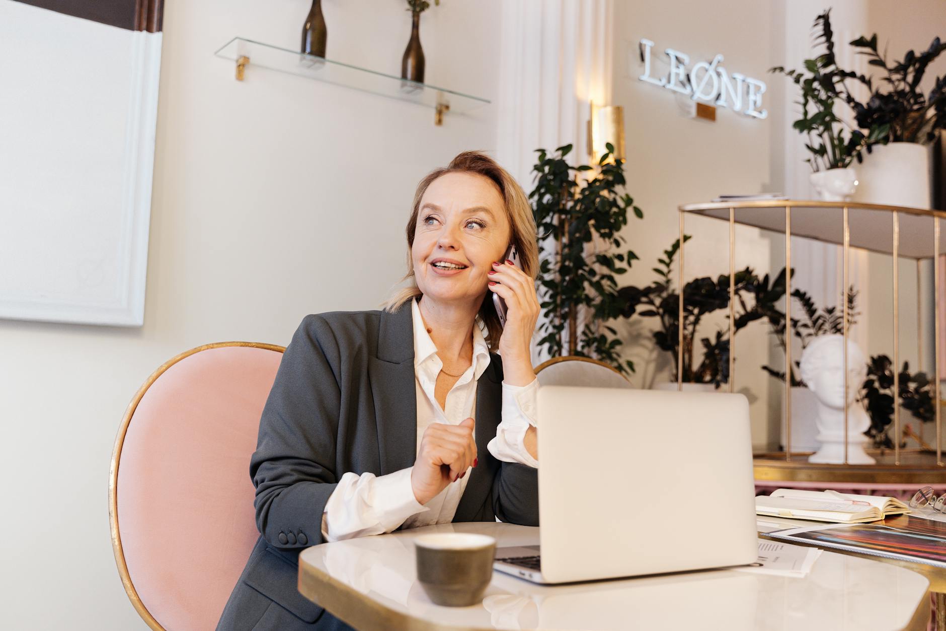 woman talking on phone at work