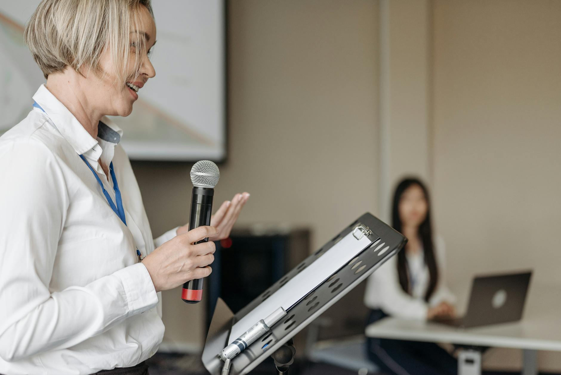 a woman holding a microphone