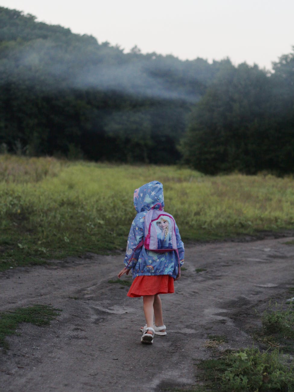 a girl with a backpack