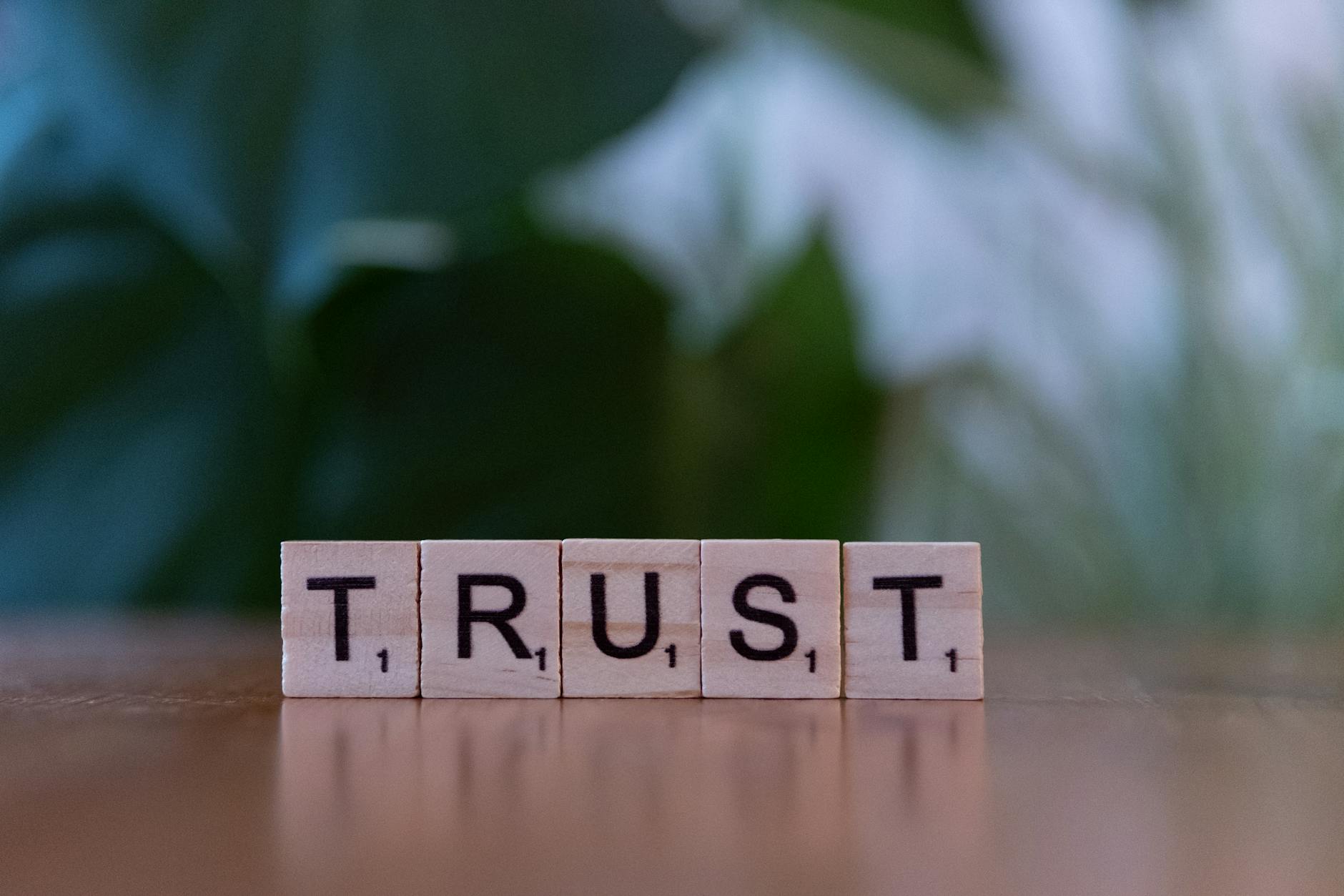 trust concept with wooden letter tiles