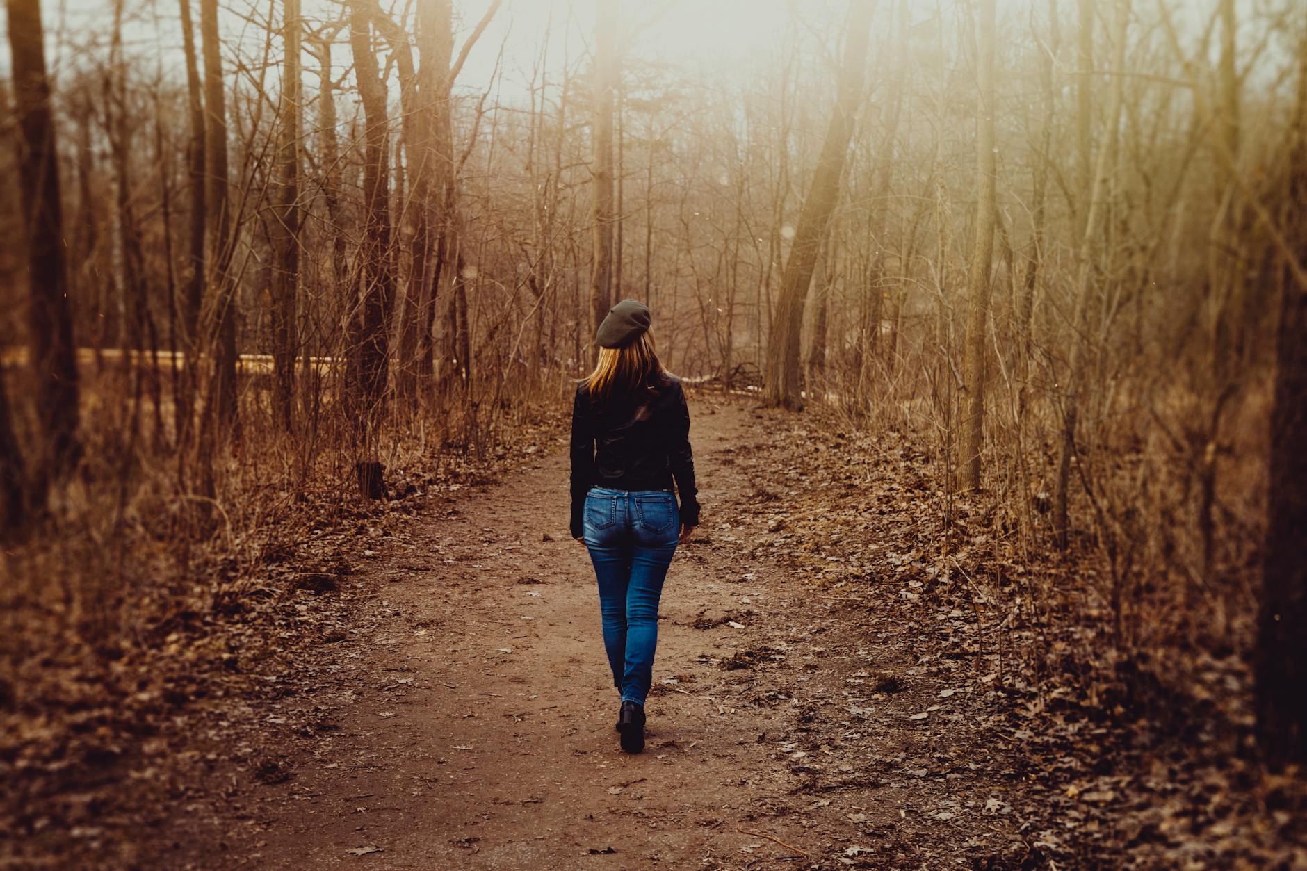 woman walking in the forest