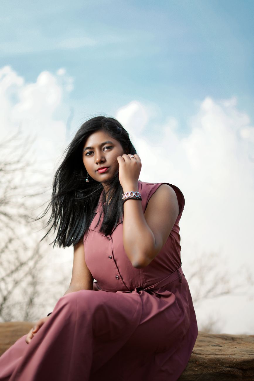 elegant portrait of a woman outdoors