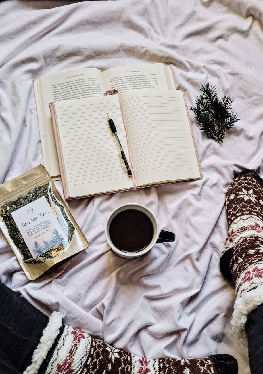 book notebook pen and tea